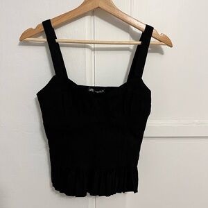 Zara black top with fitted bust and ruffle edge